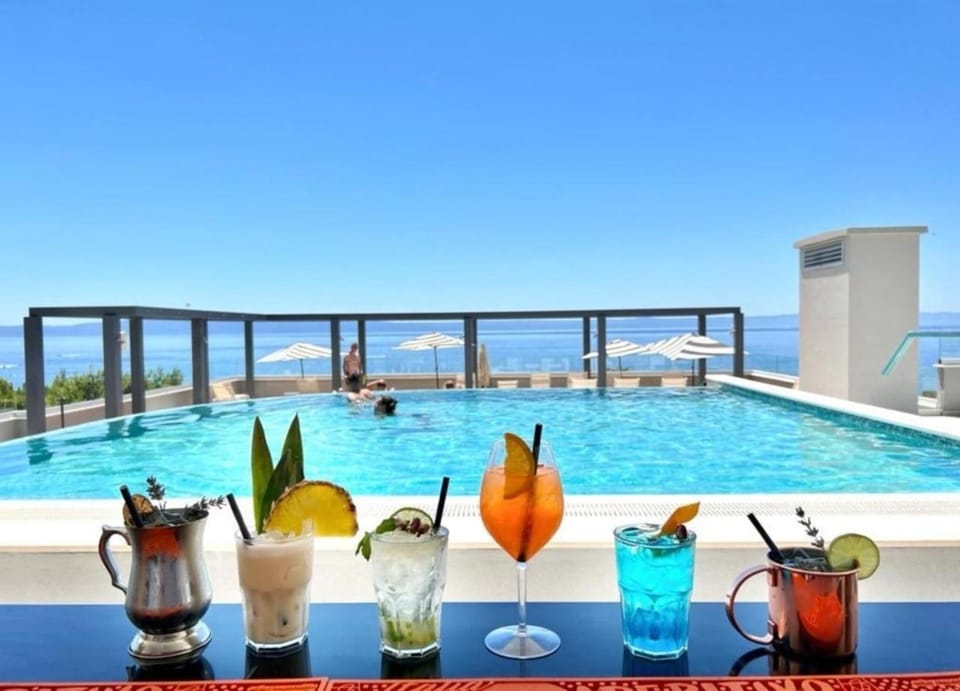 View (from property/room), Pool view, Swimming pool, Drinks, sunbed