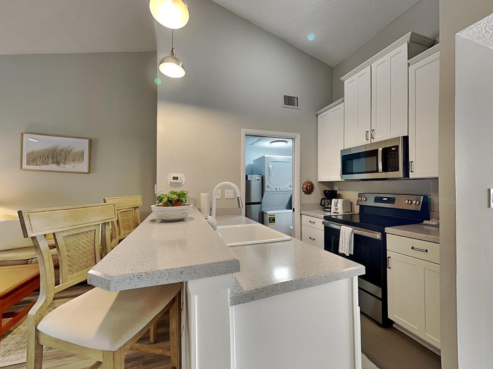 Kitchen or kitchenette, Dining area, furniture, microwave, oven, kitchen