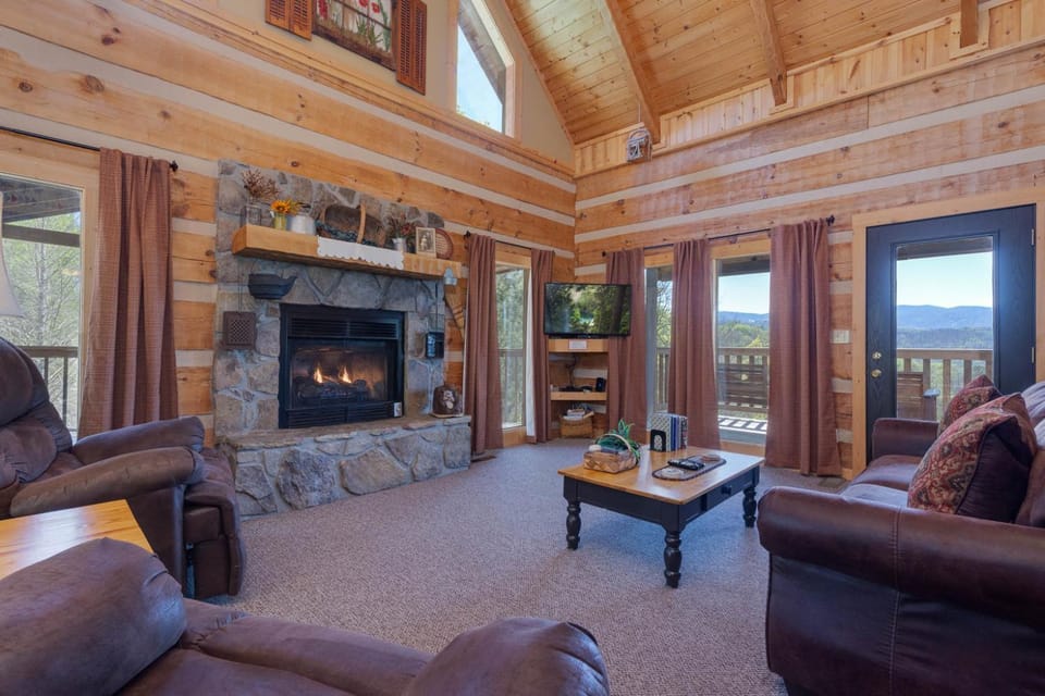 TV and multimedia, Living room, Seating area, Mountain view, fireplace, furniture
