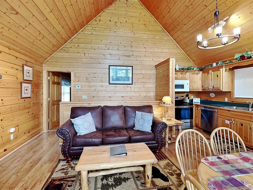 Kitchen or kitchenette, Living room, Seating area, furniture, microwave, oven