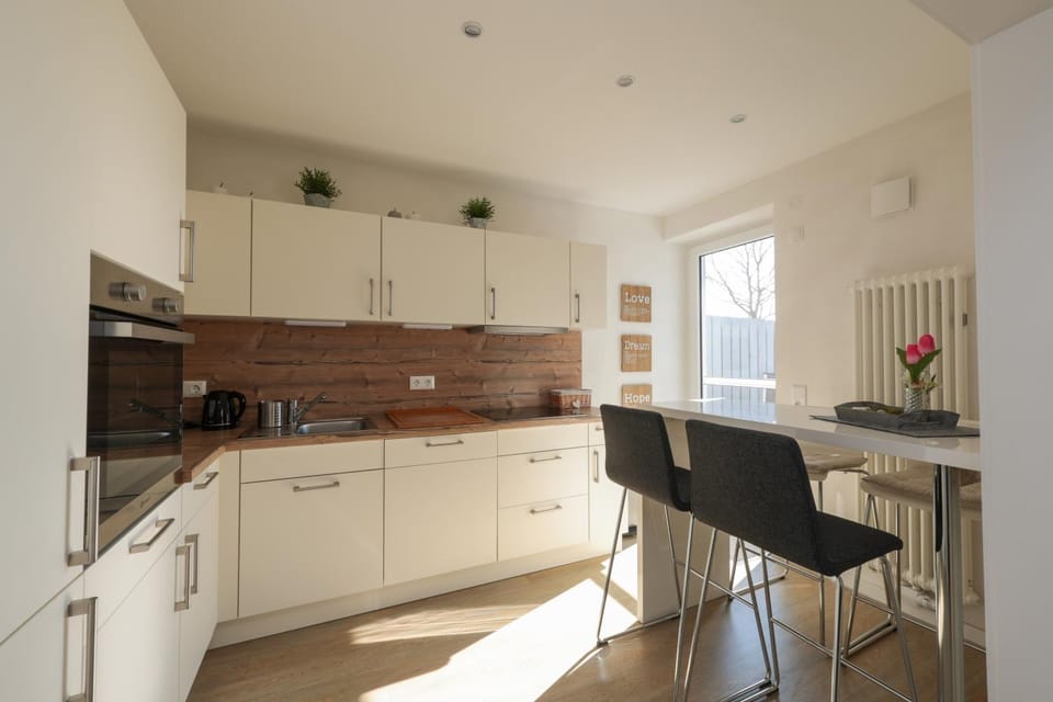 Kitchen or kitchenette, Dining area, dishwasher, stove, toaster