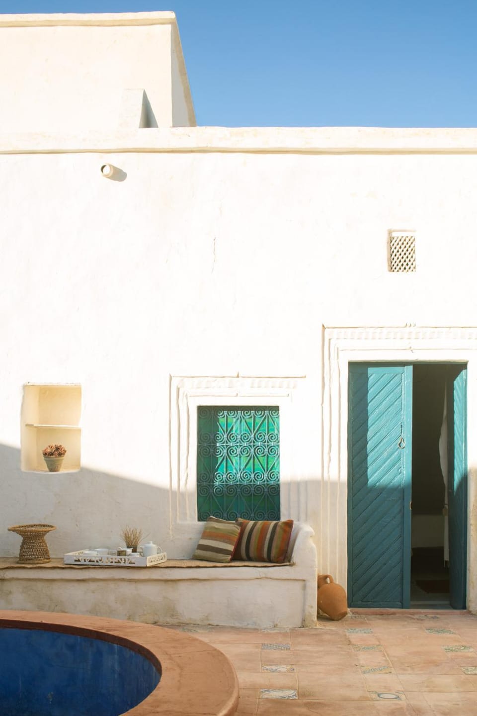 Property building, Patio, Patio, Decorative detail, Decorative detail, Bedroom, Swimming pool, furniture, furniture