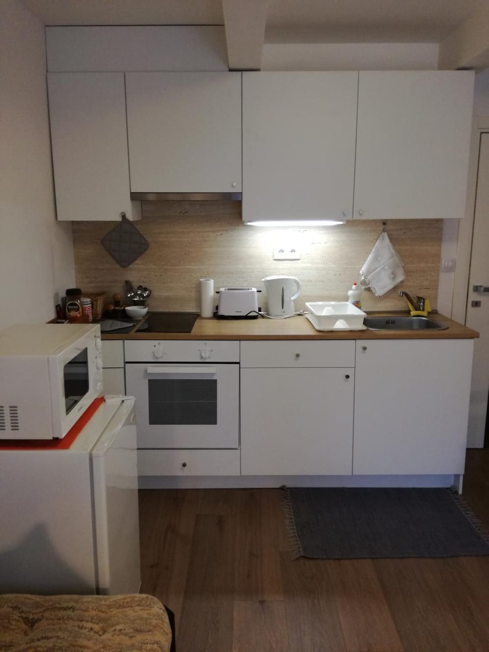 Kitchen or kitchenette, stove, toaster