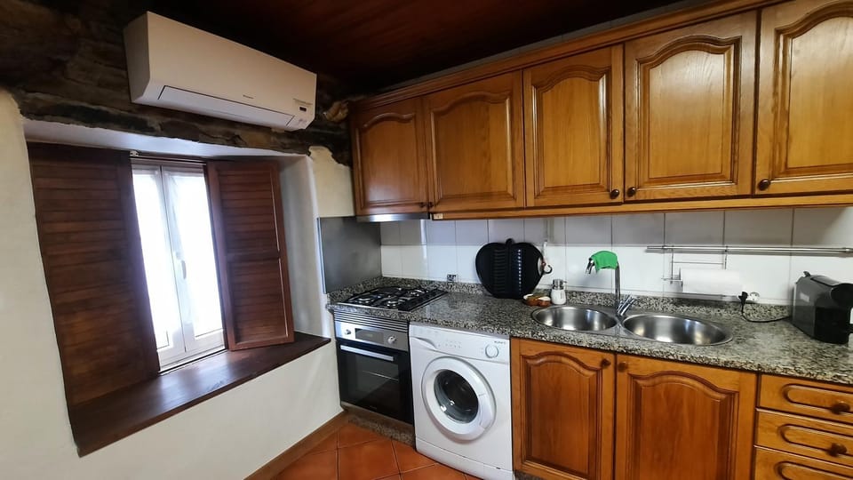 Kitchen or kitchenette, stove, toaster