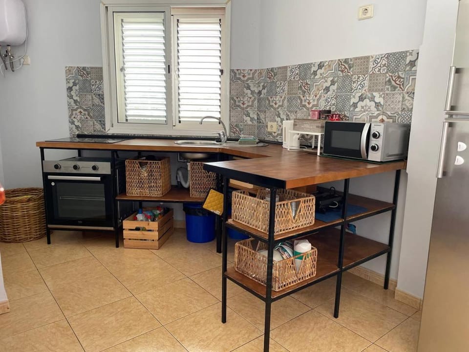 Kitchen or kitchenette, stove