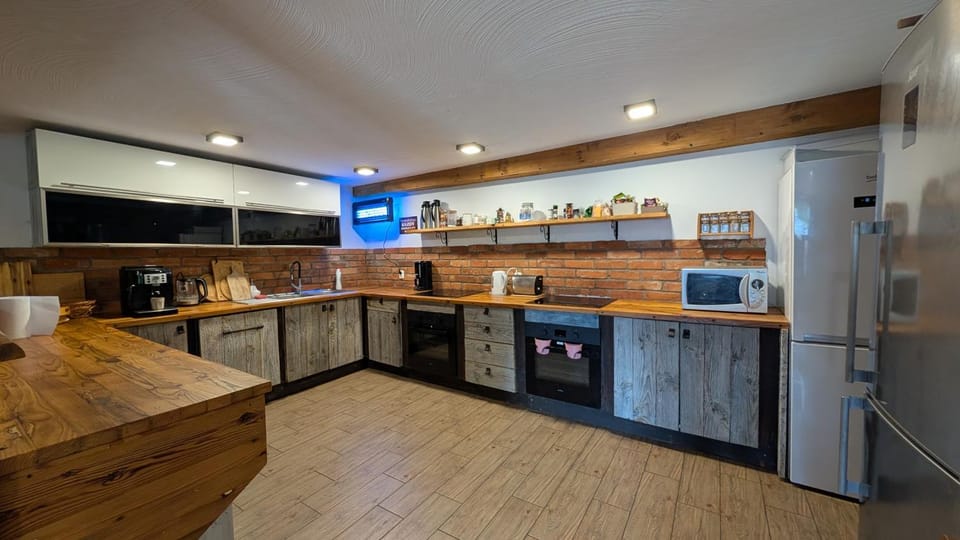 Kitchen or kitchenette, dishwasher, oven, stove, toaster
