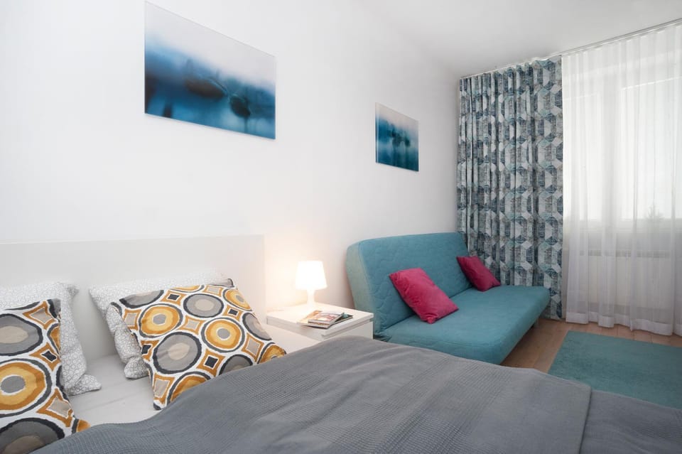 Bed, Living room, Seating area, Bedroom