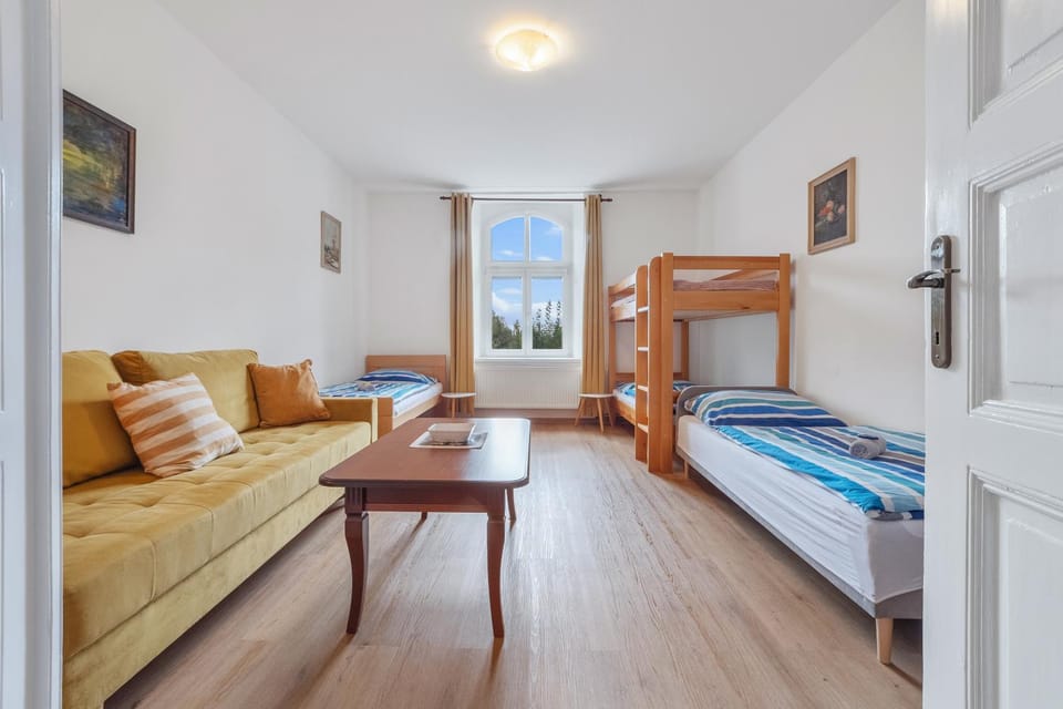 Bed, Living room, Seating area, Bedroom