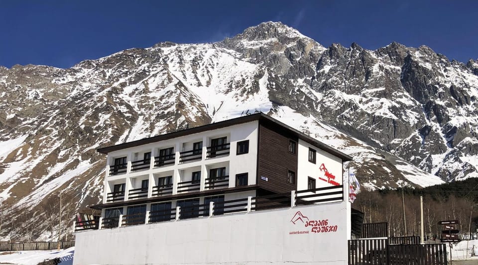 Property building, Facade/entrance, Day, Natural landscape, Winter, Mountain view