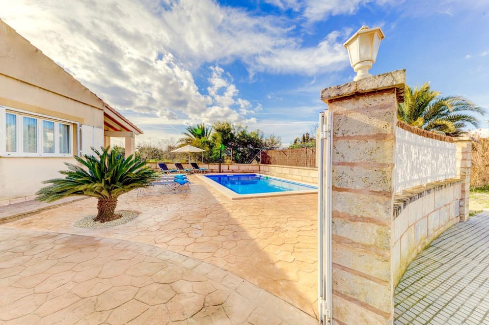 Property building, Patio, Facade/entrance, Pool view, sunbed
