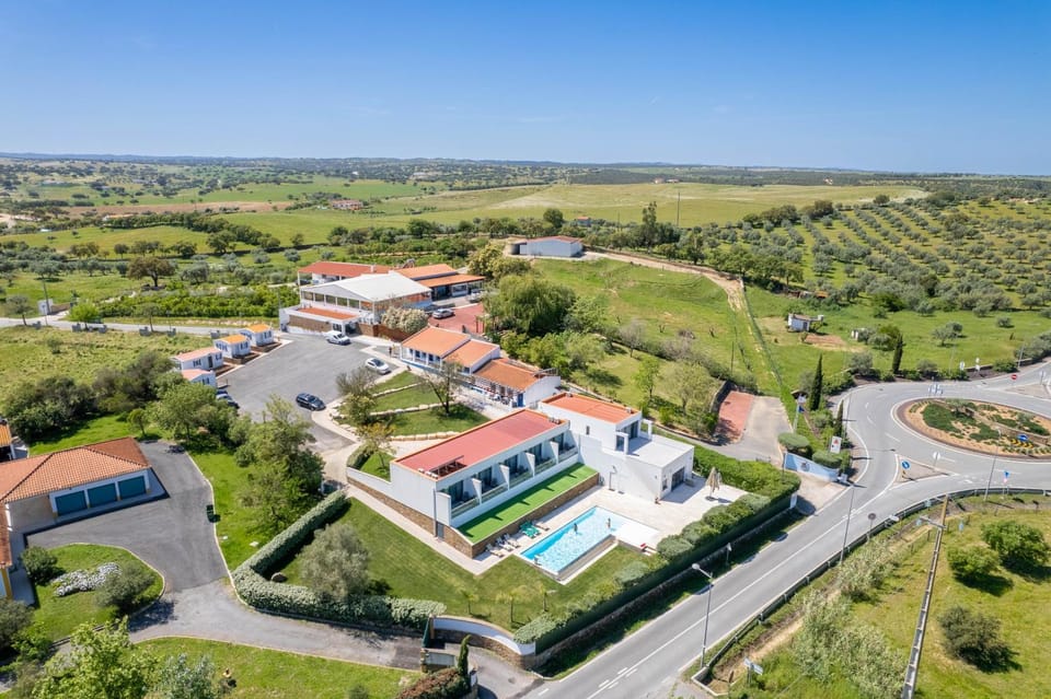 Property building, Spring, Day, Natural landscape, Bird's eye view, Pool view, Street view, Swimming pool