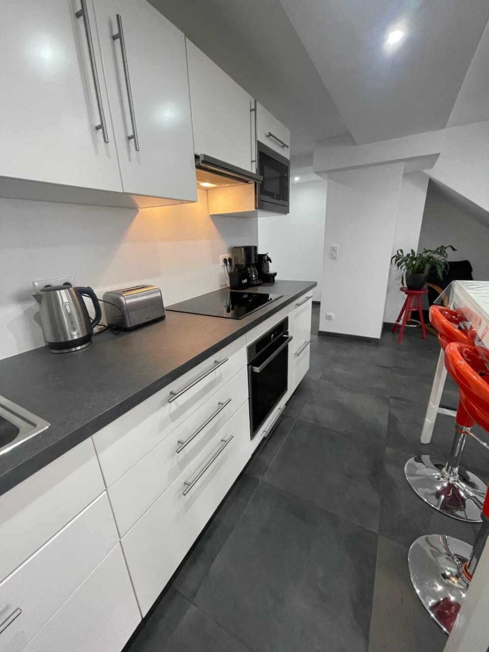 Kitchen or kitchenette, oven, stove