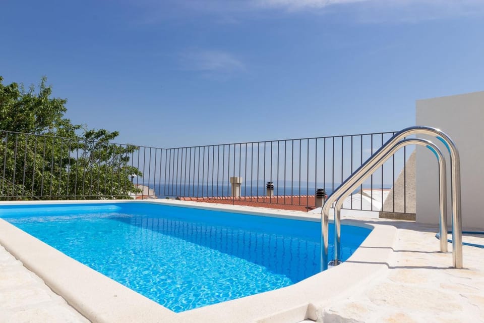 Balcony/Terrace, Seating area, Sea view, Swimming pool