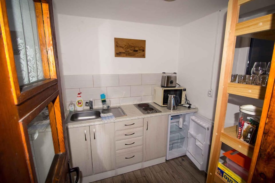 Kitchen or kitchenette, microwave