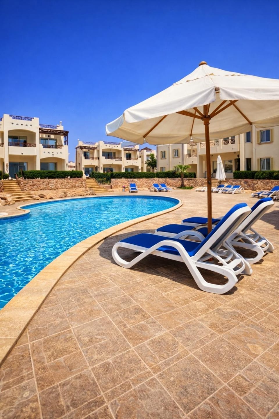Property building, Pool view, Swimming pool, sunbed