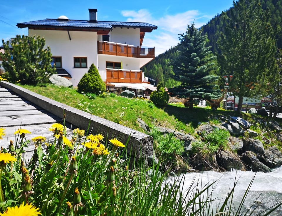 Property building, Day, Natural landscape, Summer, Mountain view, River view