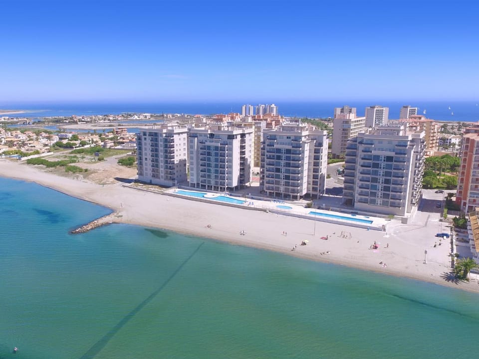 Property building, Facade/entrance, Day, Bird's eye view, Balcony/Terrace, Beach, Pool view, Sea view, Swimming pool