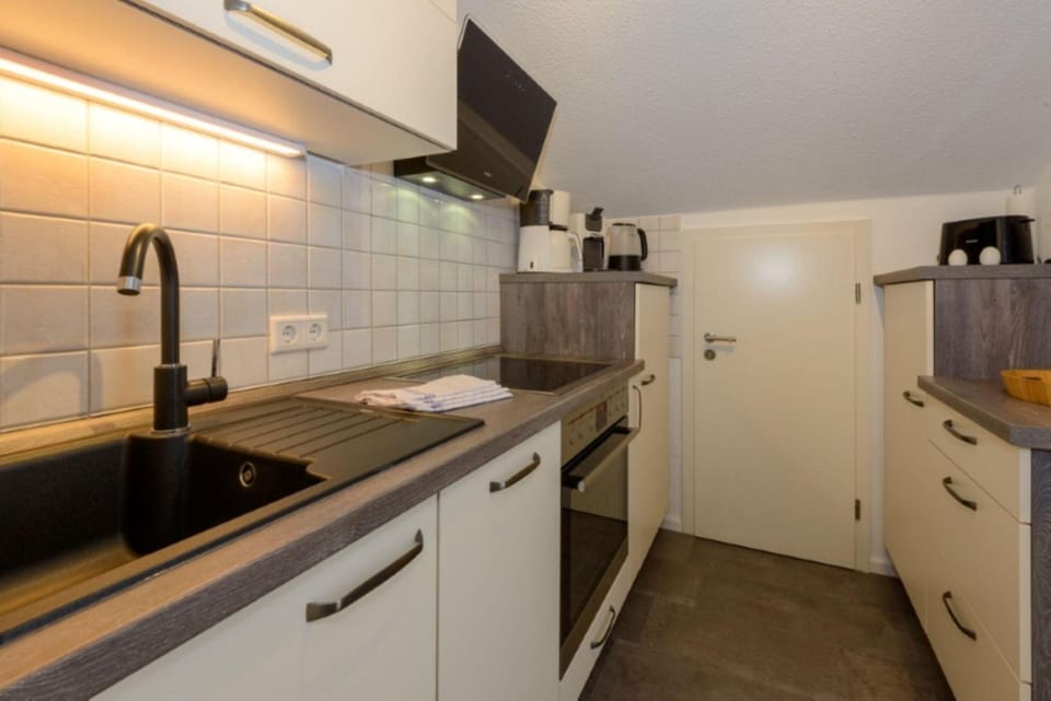 Kitchen or kitchenette, oven, stove