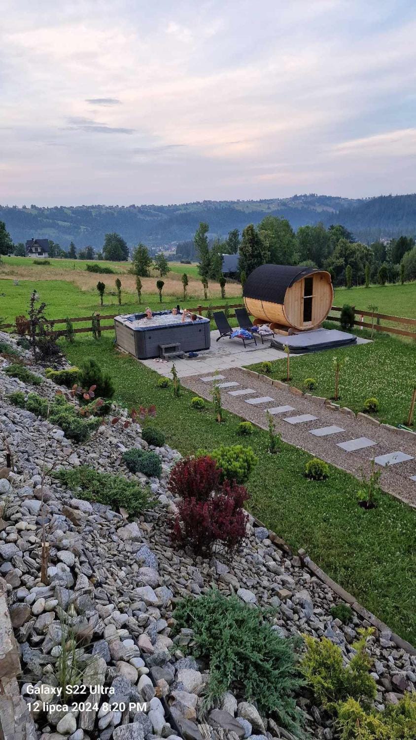 Property building, Nearby landmark, Day, Natural landscape, Sauna, Mountain view