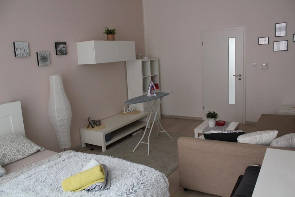 Bed, Living room, Seating area, Bedroom