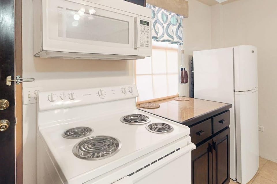 Family Getaway Suite at Hummingbird Home Suites Gold Standard Certified Apartment in San Pedro