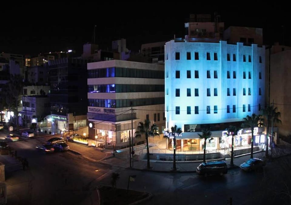 Property building, Night, City view, Street view, Location, Parking
