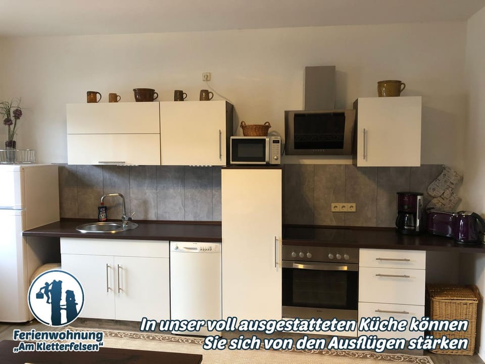 Property building, Nearby landmark, Day, Property logo or sign, Property logo or sign, Winter, Coffee/tea facilities, Kitchen or kitchenette, Photo of the whole room, Decorative detail, Decorative detail, Communal kitchen, On site, Food, Text overlay, Text overlay, Landmark view, Drinks