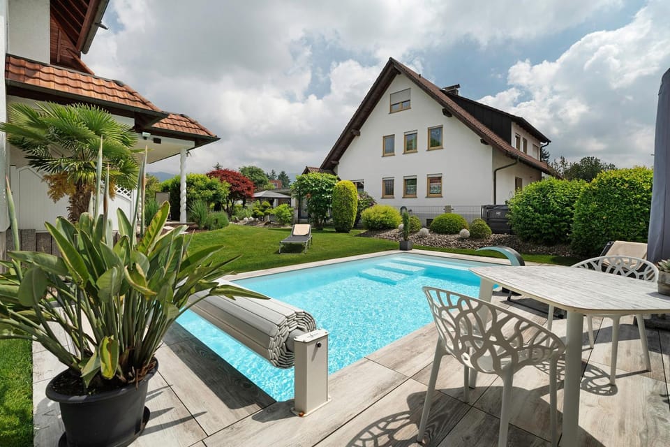 Property building, Living room, Swimming pool