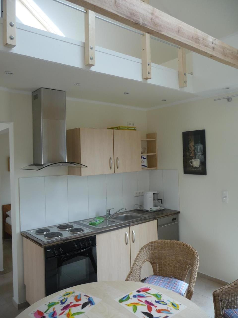 Kitchen or kitchenette, oven, stove, toaster