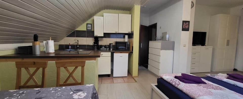Kitchen or kitchenette, stove