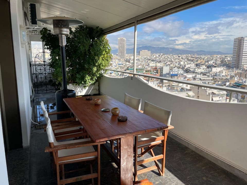 View (from property/room), Balcony/Terrace, Seating area, City view