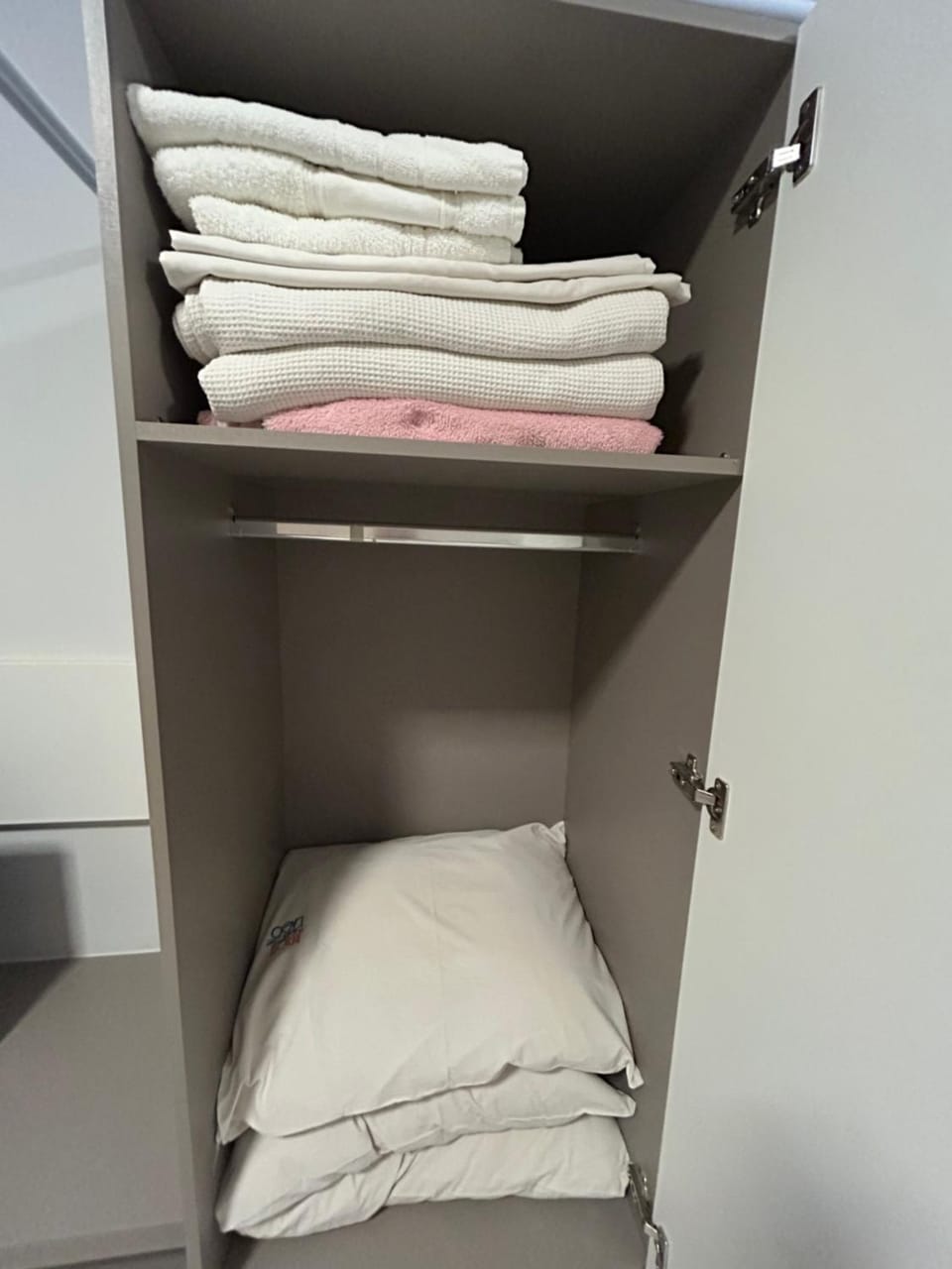 microwave, towels, wardrobe