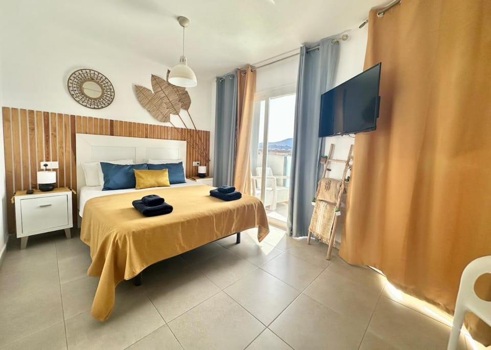 Candy Pop - AC, High speed internet ,Desk with natural light, Pool and two Terraces Apartment in Corralejo