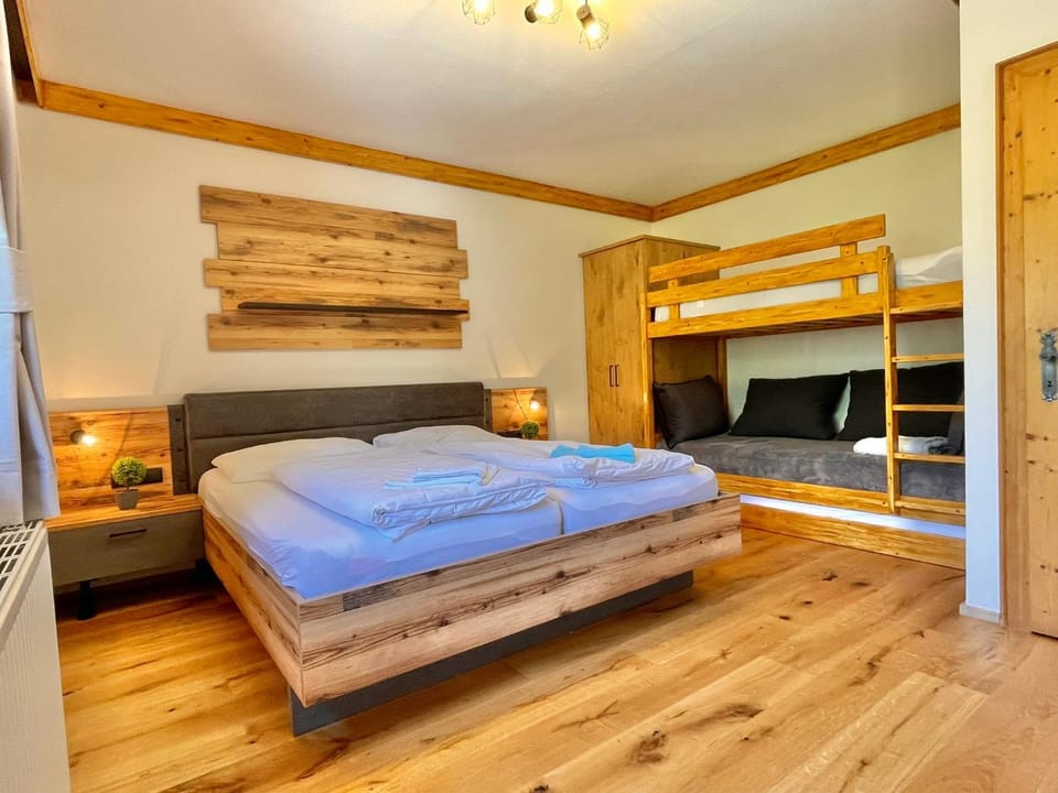 Bed, Photo of the whole room, Bedroom, bunk bed, towels