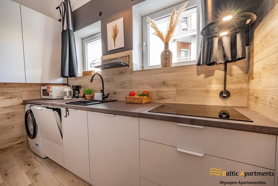 Kitchen or kitchenette, dishwasher, stove, washing machine