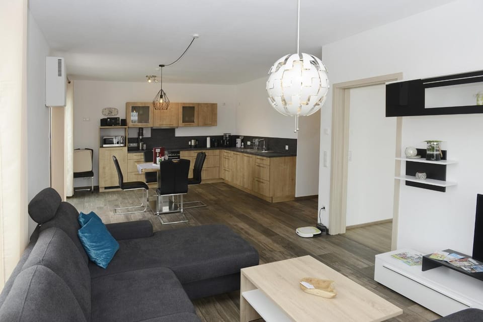 Kitchen or kitchenette, Living room, Seating area, Dining area