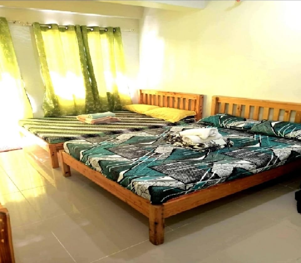 Condo Transient Near NAIA Airport T1234 with Unlimited WIFI v1 Apartment in Paranaque