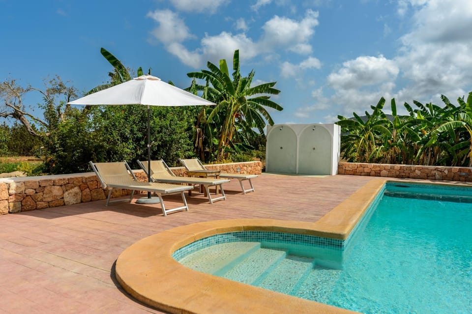 Property building, Living room, Swimming pool