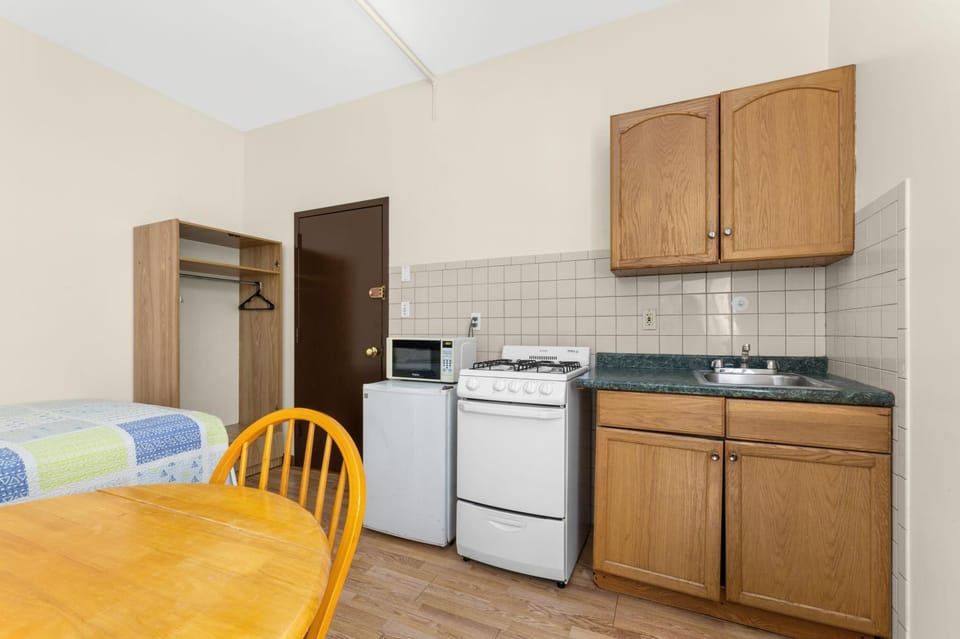 Kitchen or kitchenette, stove