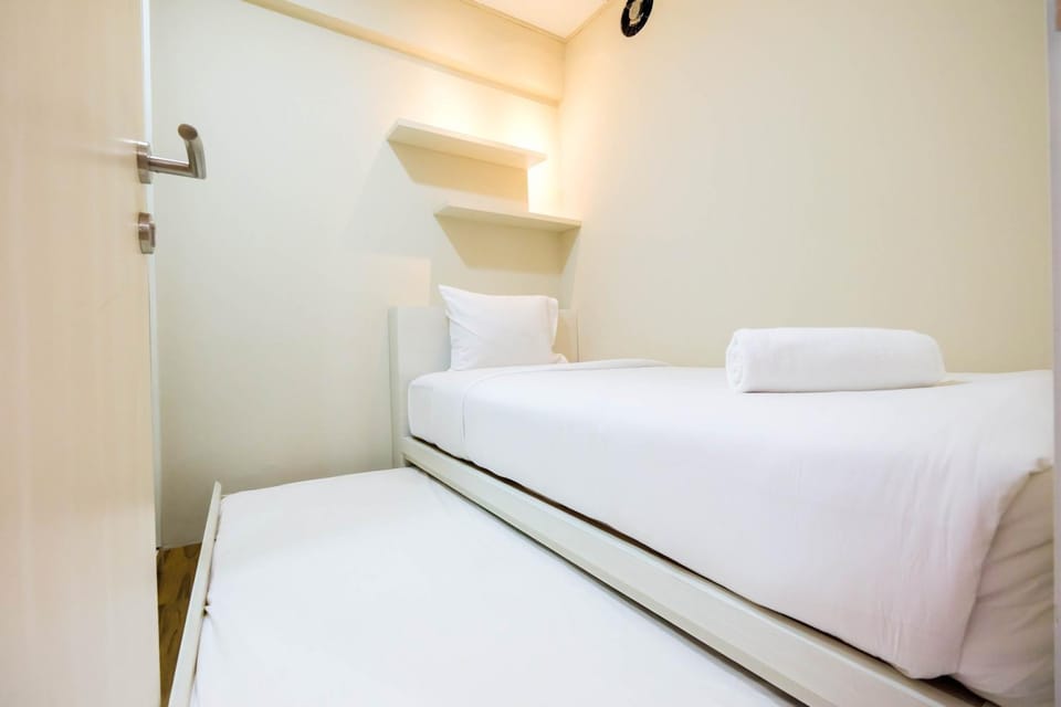 Connect to Pool 2BR Apartment at Bassura City By Travelio Apartment in Jakarta