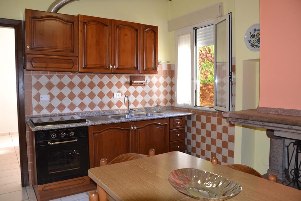 Kitchen or kitchenette, oven, stove