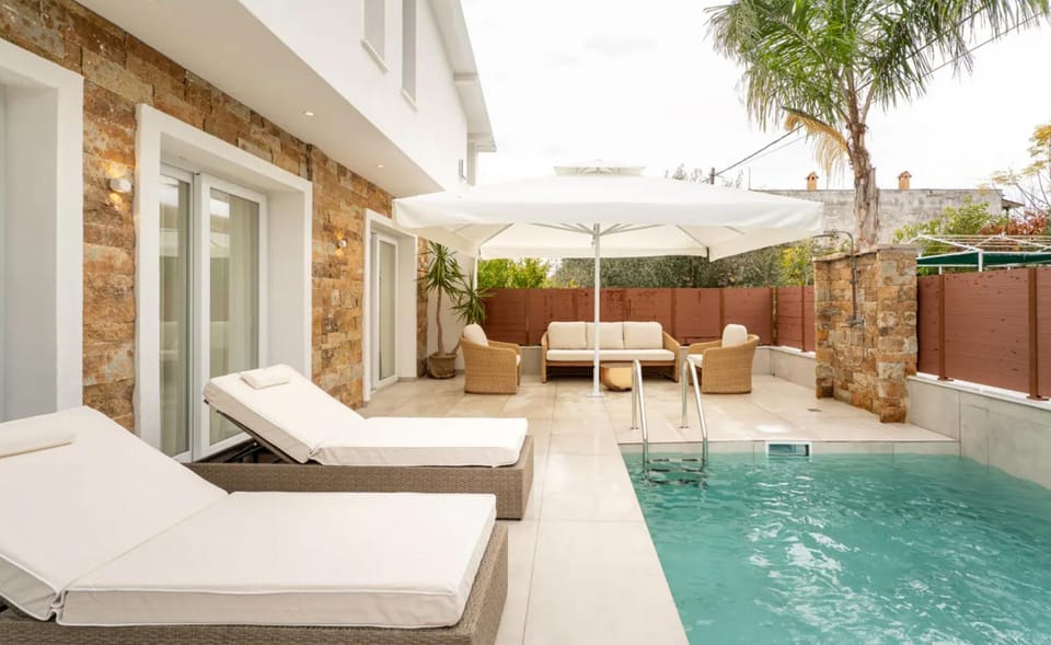 Day, Natural landscape, Garden, Seating area, Pool view, Swimming pool, sunbed