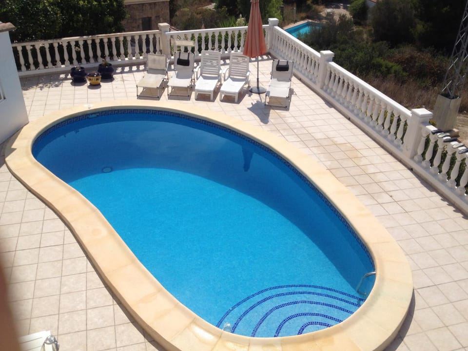 Patio, Day, Pool view, Swimming pool, sunbed