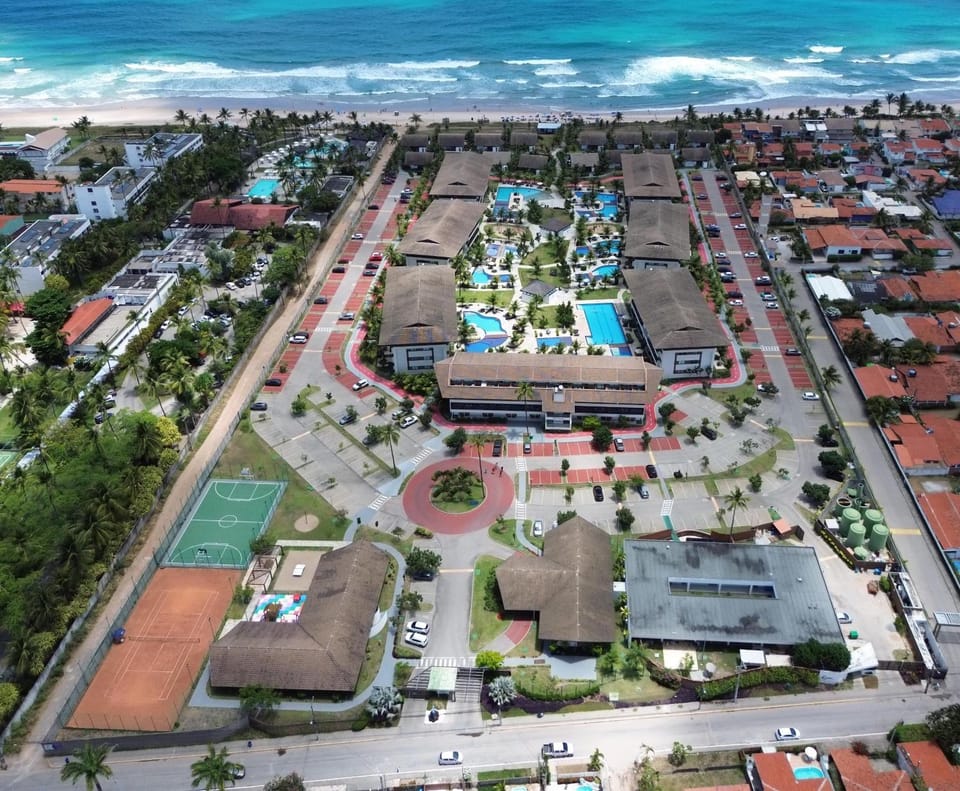 Property building, Bird's eye view, Beach, Sea view, Swimming pool, Location