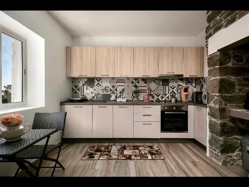 Kitchen or kitchenette, oven, stove