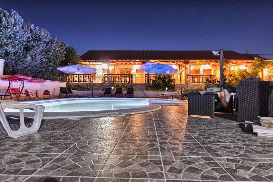 Property building, Patio, Pool view, Swimming pool, Swimming pool, sunbed