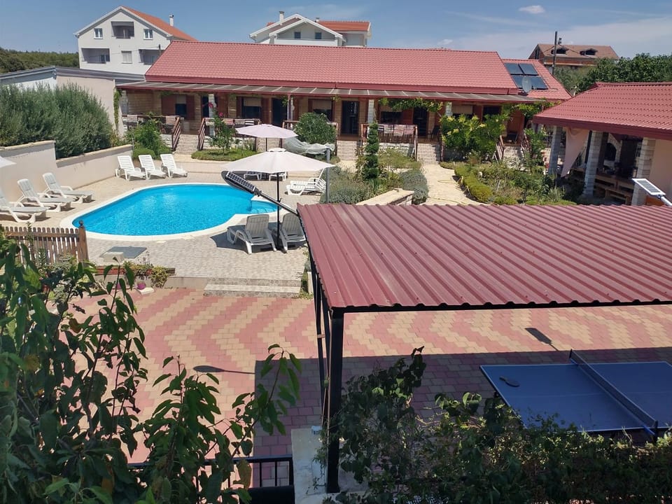 Property building, Patio, Pool view, Swimming pool