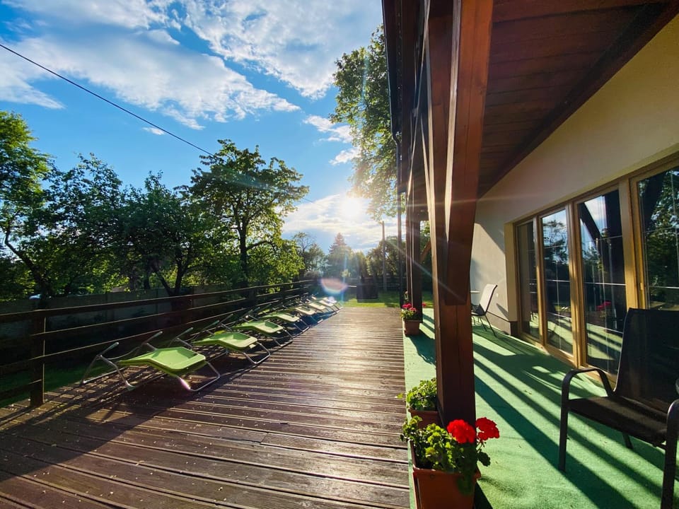 Property building, Day, Natural landscape, Garden, Balcony/Terrace, Seating area, Garden view, sunbed