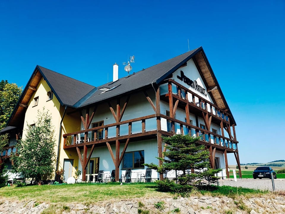 Property building, Day, View (from property/room), Seating area, Swimming pool, Parking