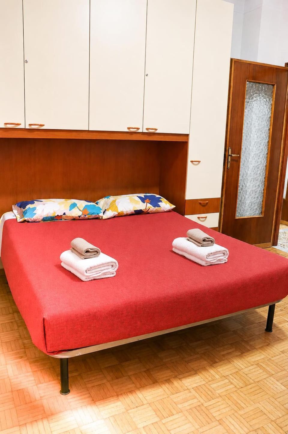 Bed, towels, wardrobe